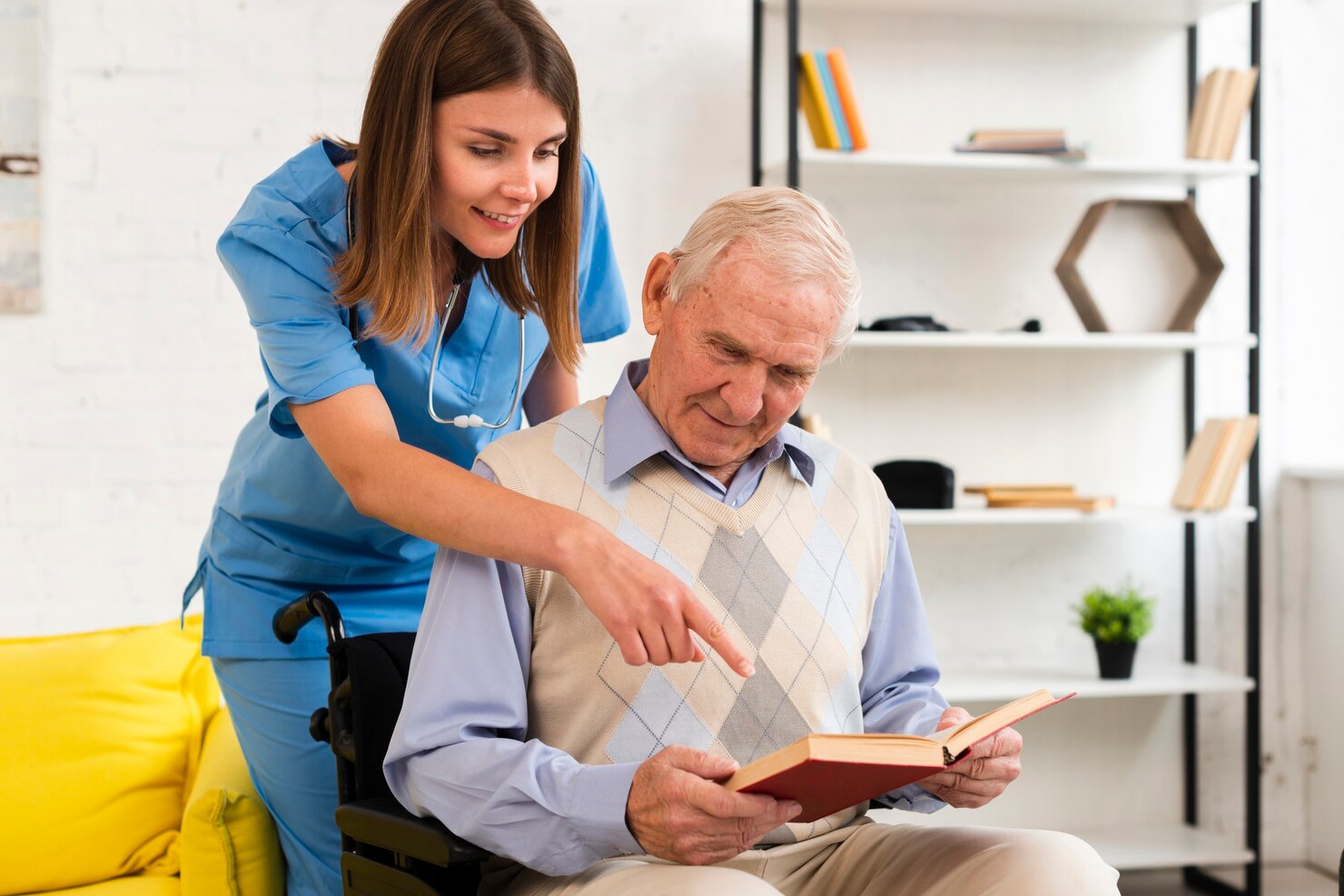 nurse-pointing-old-man-s-book_23-2148239023 nurse-pointing-old-man-s-book_23-2148239023